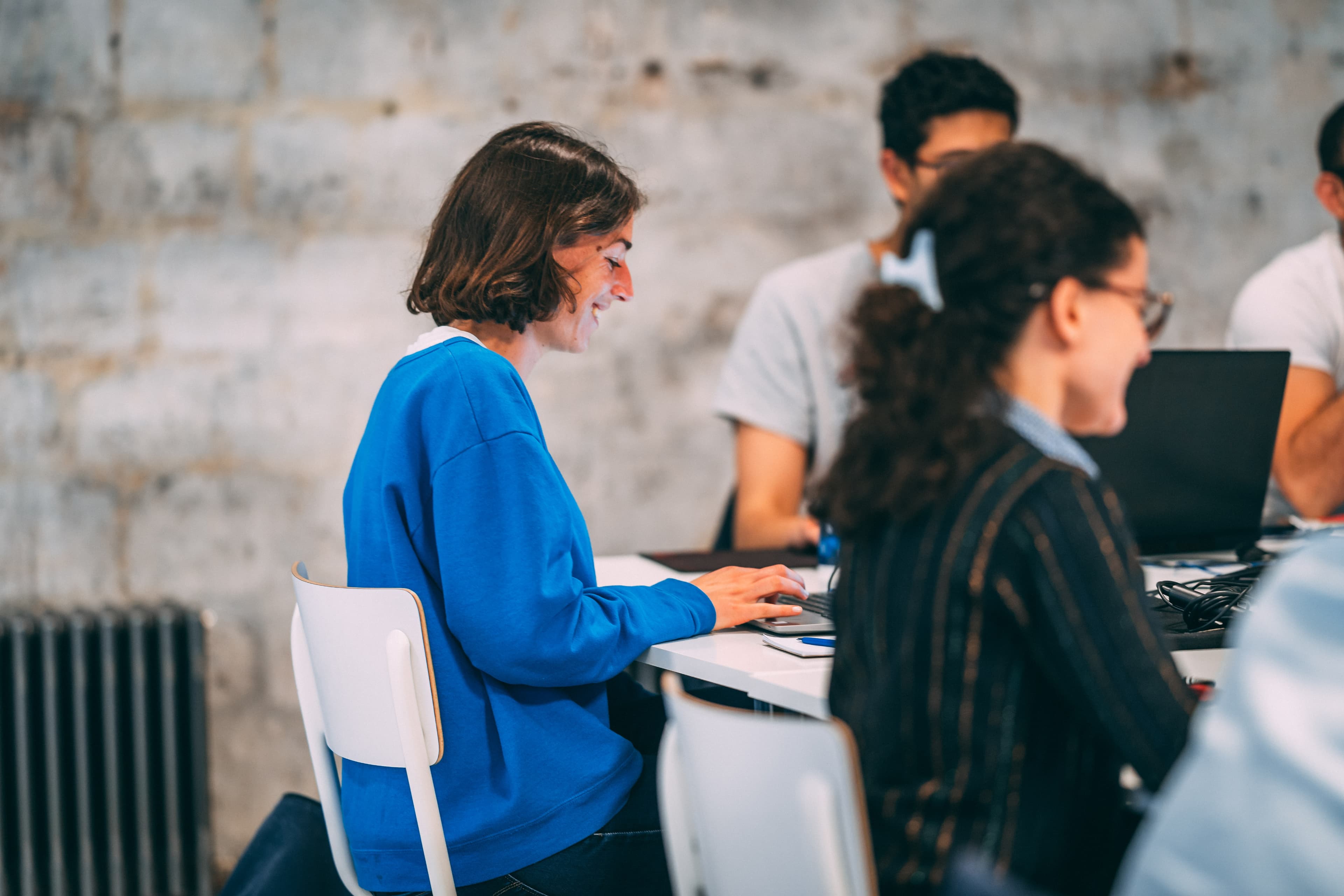 User sitting at desk using Julie
